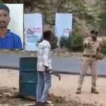 போதை ஆசாமியின் அட்ராசிட்டி..!! அரிவாளைக் காட்டி காவல்துறையினரை மிரட்டிய வீடியோ வைரல்!!
